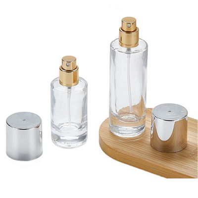 Botella de cristal transparente con tapa de tornillo 100 ml Forma redonda Diseño simple